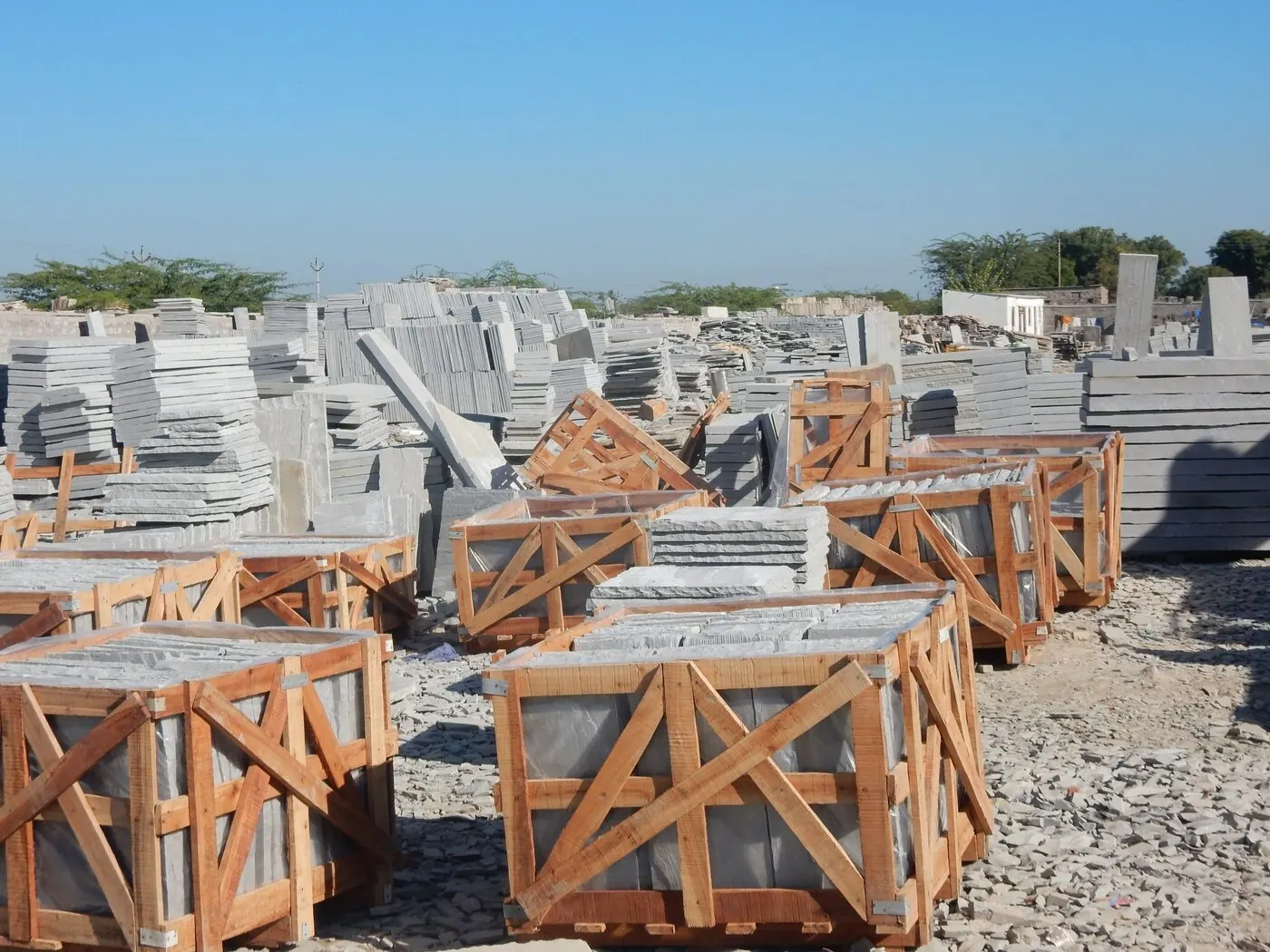 Pushpendra Stone quarry yard with stacked inventory